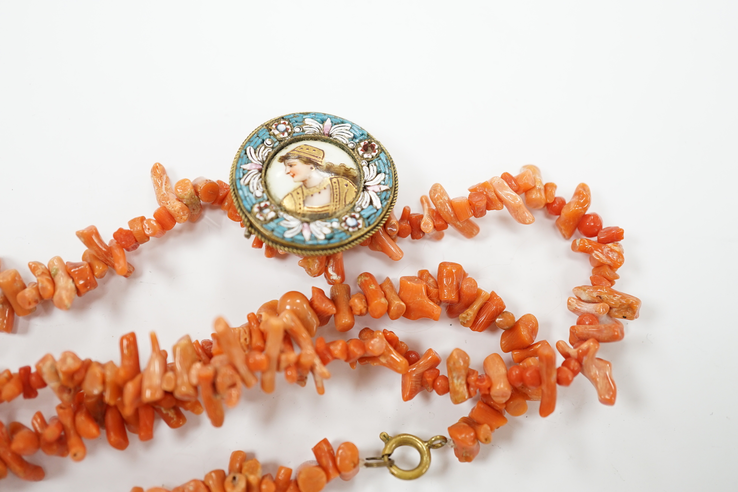 Two jagged coral necklaces, 46cm with a pair of similar earrings and a micro-mosaic and porcelain panel brooch (a.f.).